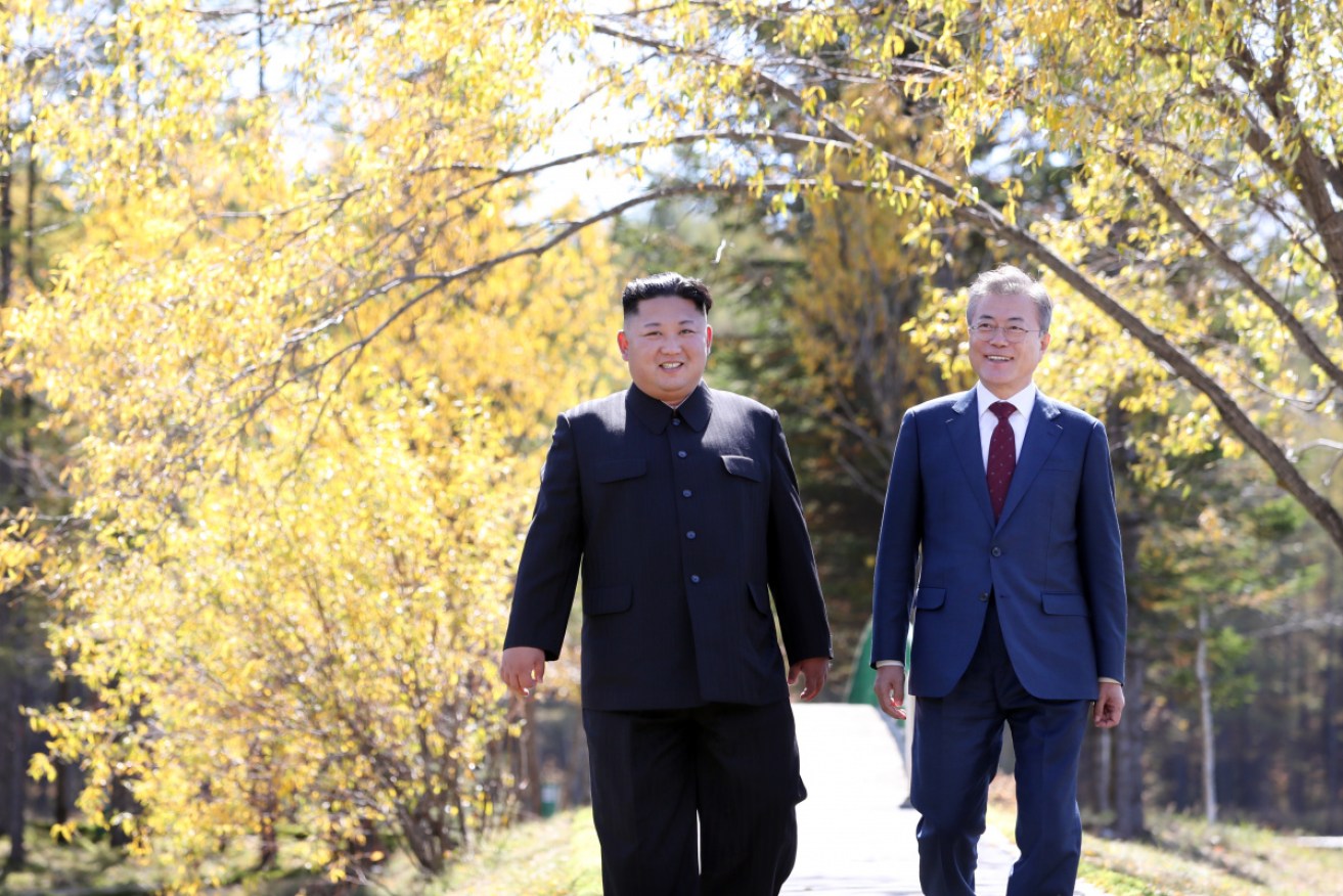 North Korea's leader Kim Jong-un and South Korean President Moon Jae-in  walk together in September in Samjiyon, North Korea.
