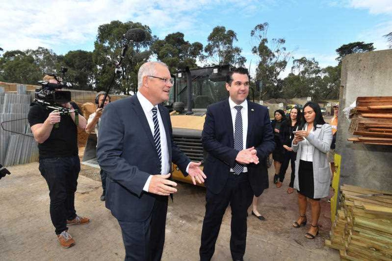 Deakin MP Michael Sukkar and Prime Minister Scott Morrison visiting a Melbourne business on Monday.
