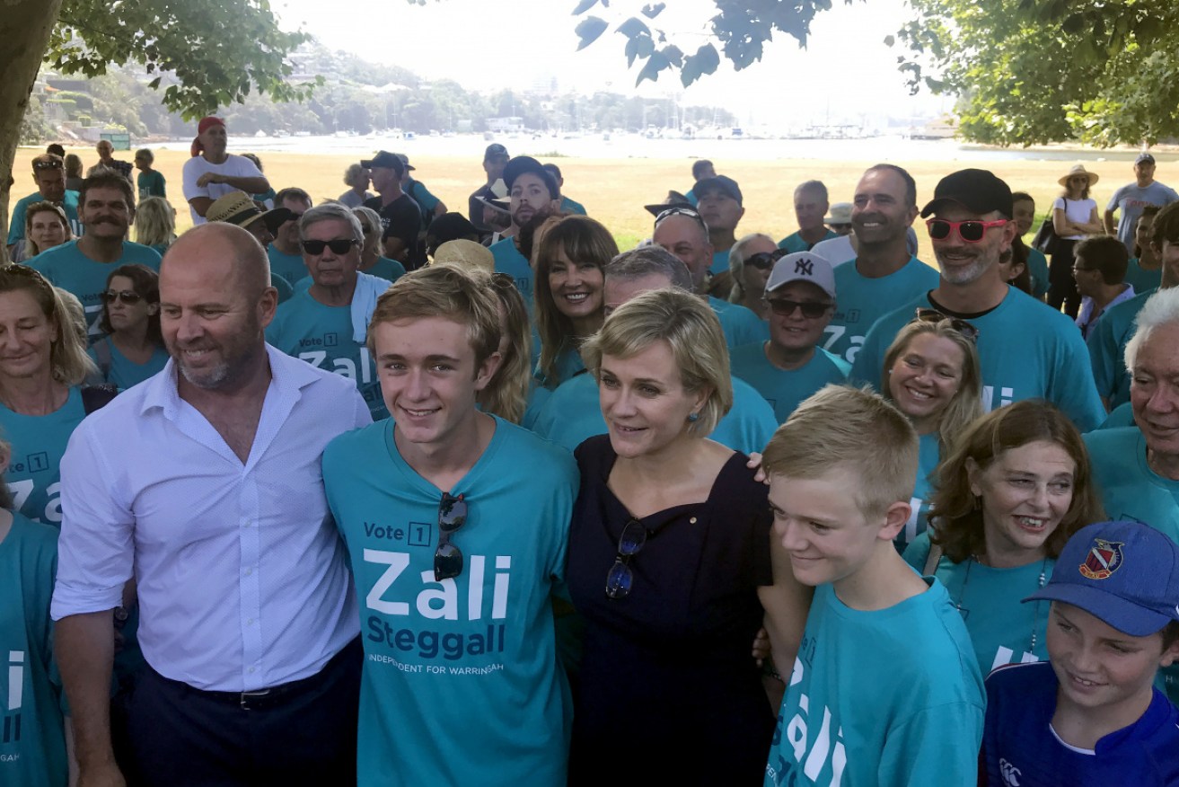 Warringah candidate Zali Steggall with her two sons at a campaign event.