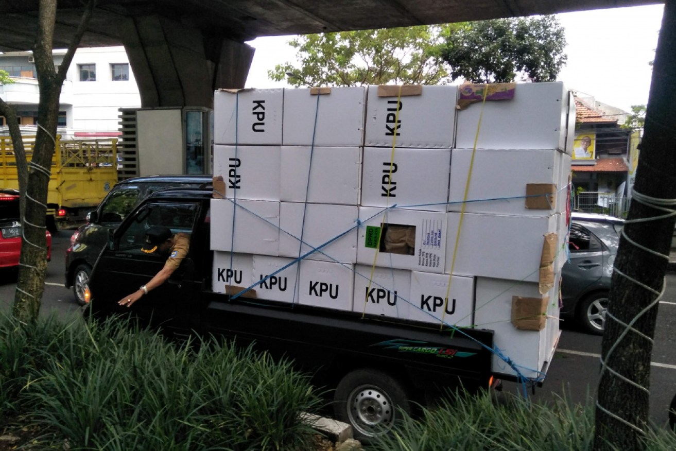 General Elections Commission (KPU) staff delivery ballots around Bandung, Indonesia's third biggest city, before the election. 