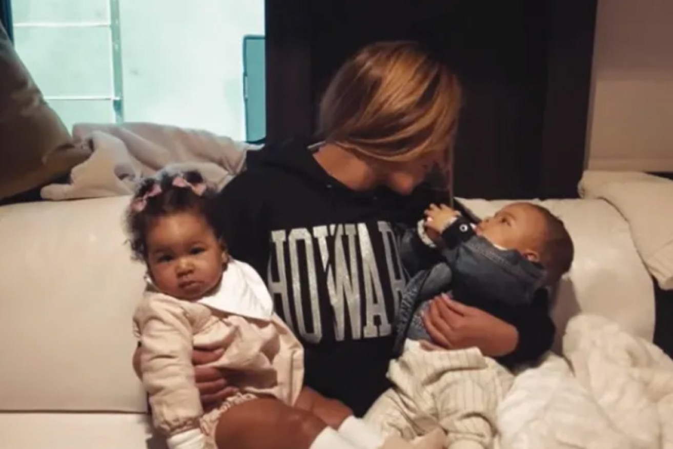 Beyonce has a private moment with (left) Rumi and Sir Carter in her new <i>Homecoming</i> documentary.