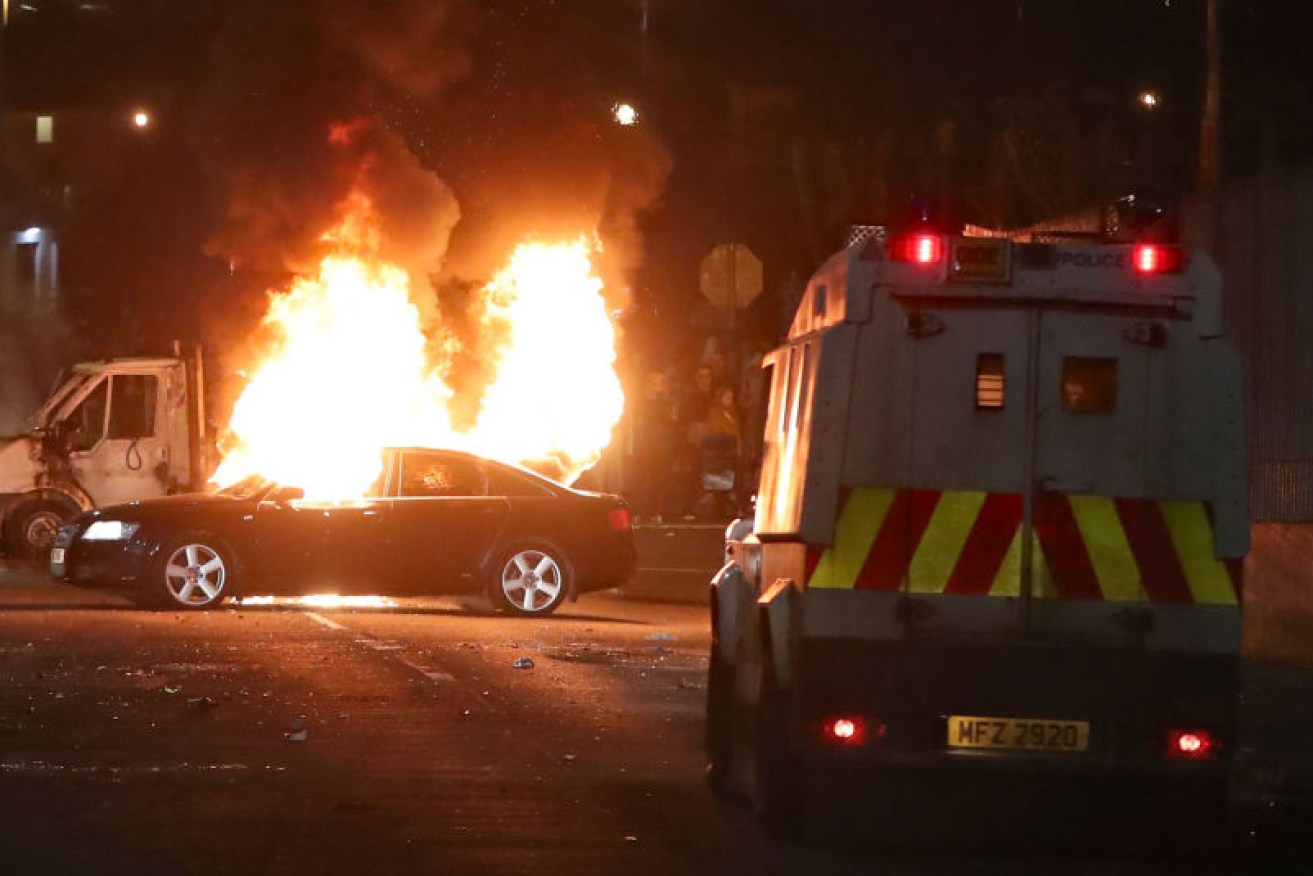 Hijacked vehicles on fire in Creggan, Londonderry.