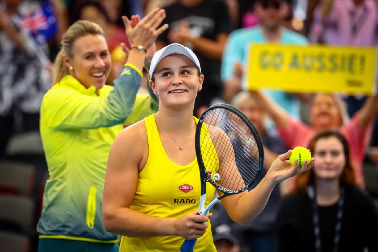 Ashleigh Barty (front) who helped take Australia to its first Fed Cup final since 1993.
