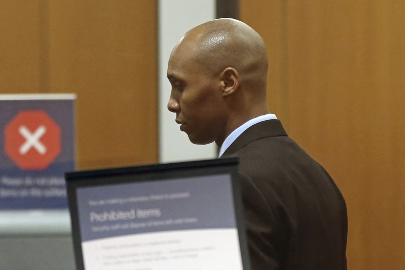 Mohamed Noor waits to go through security at the Hennepin County Government Center during the fourth week of his trial.