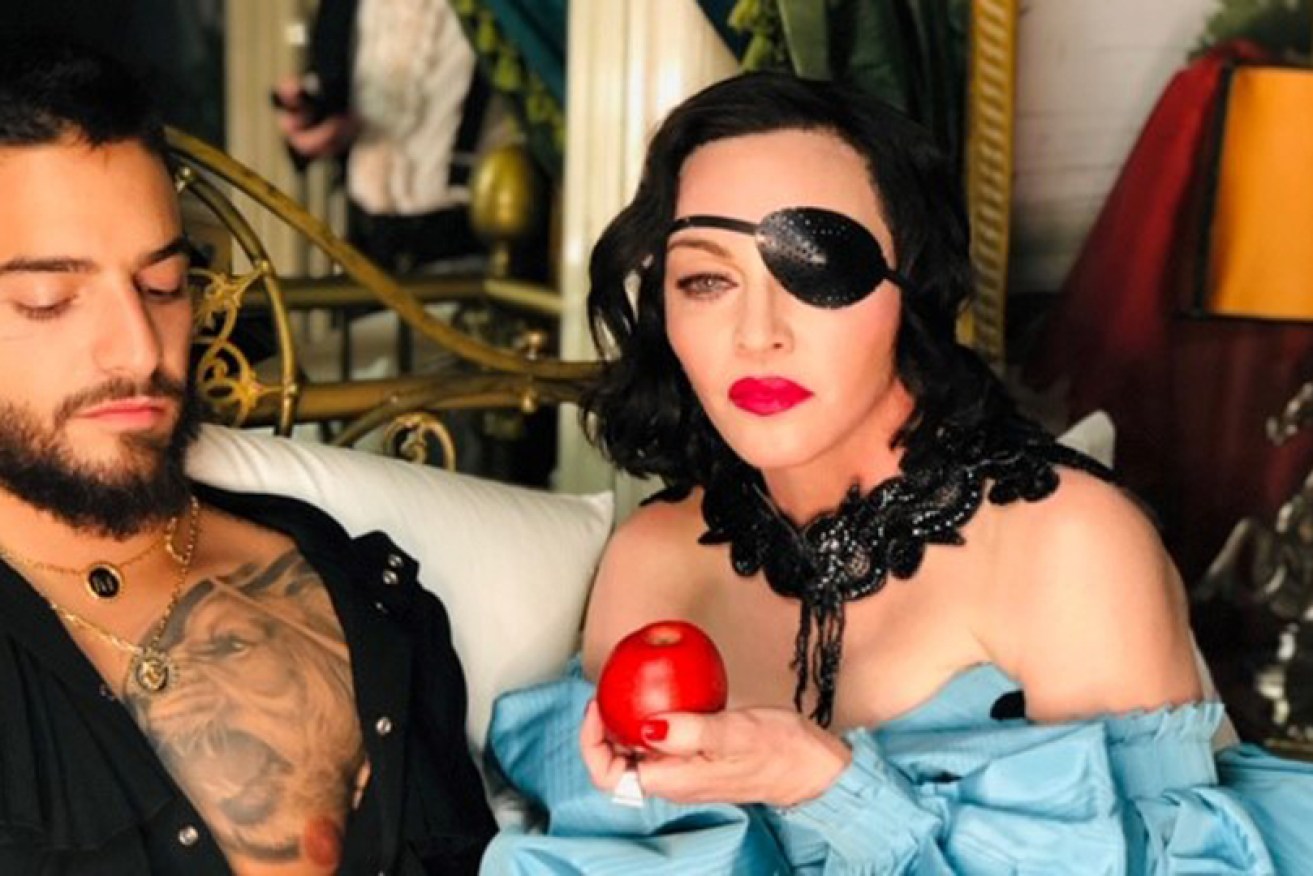 Maluma, Madonna and some forbidden fruit imagery in the star's new <i>Medellin</i> video.