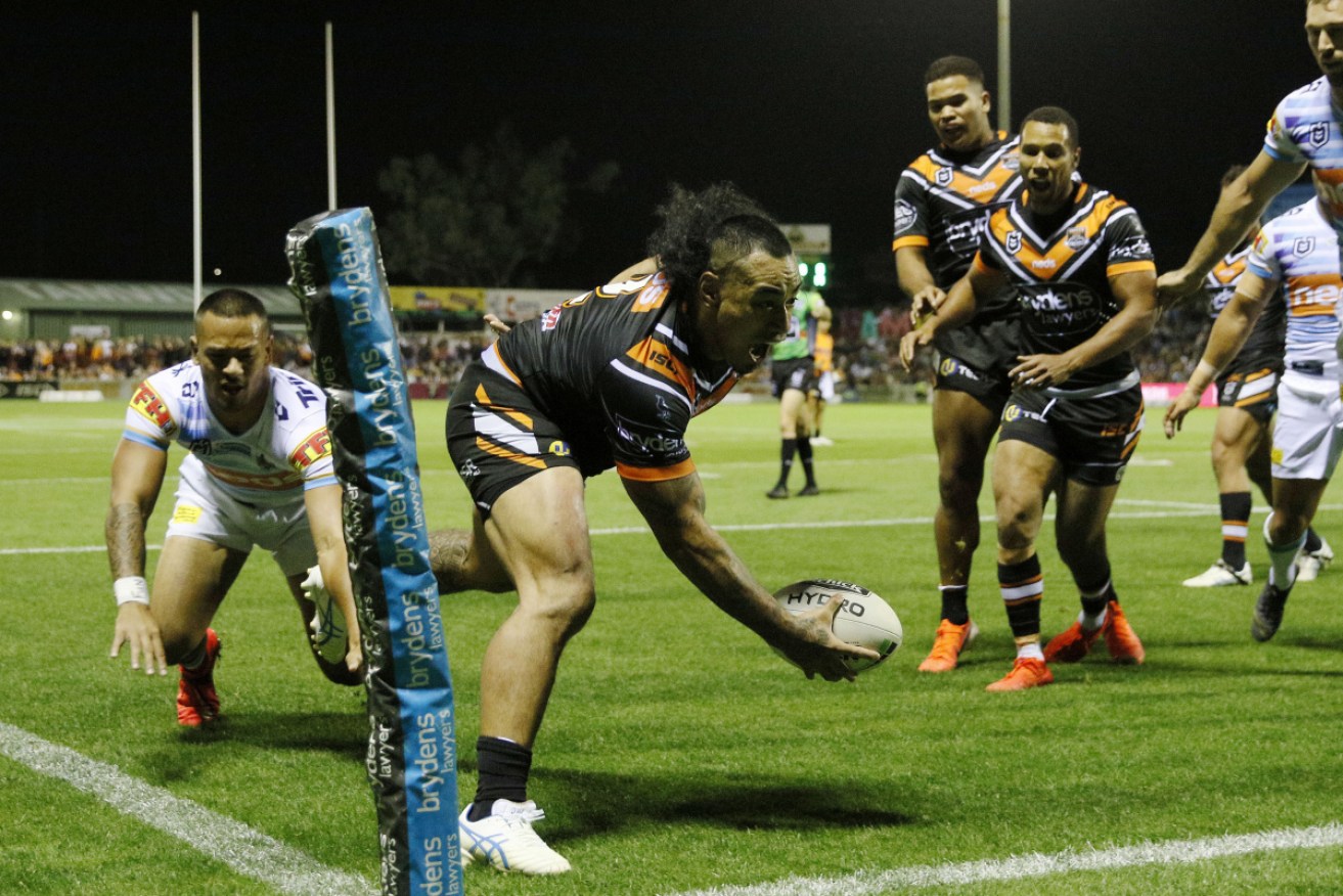 Wests' Mahe Fonua on his way to a hat-trick against Gold Coast.   