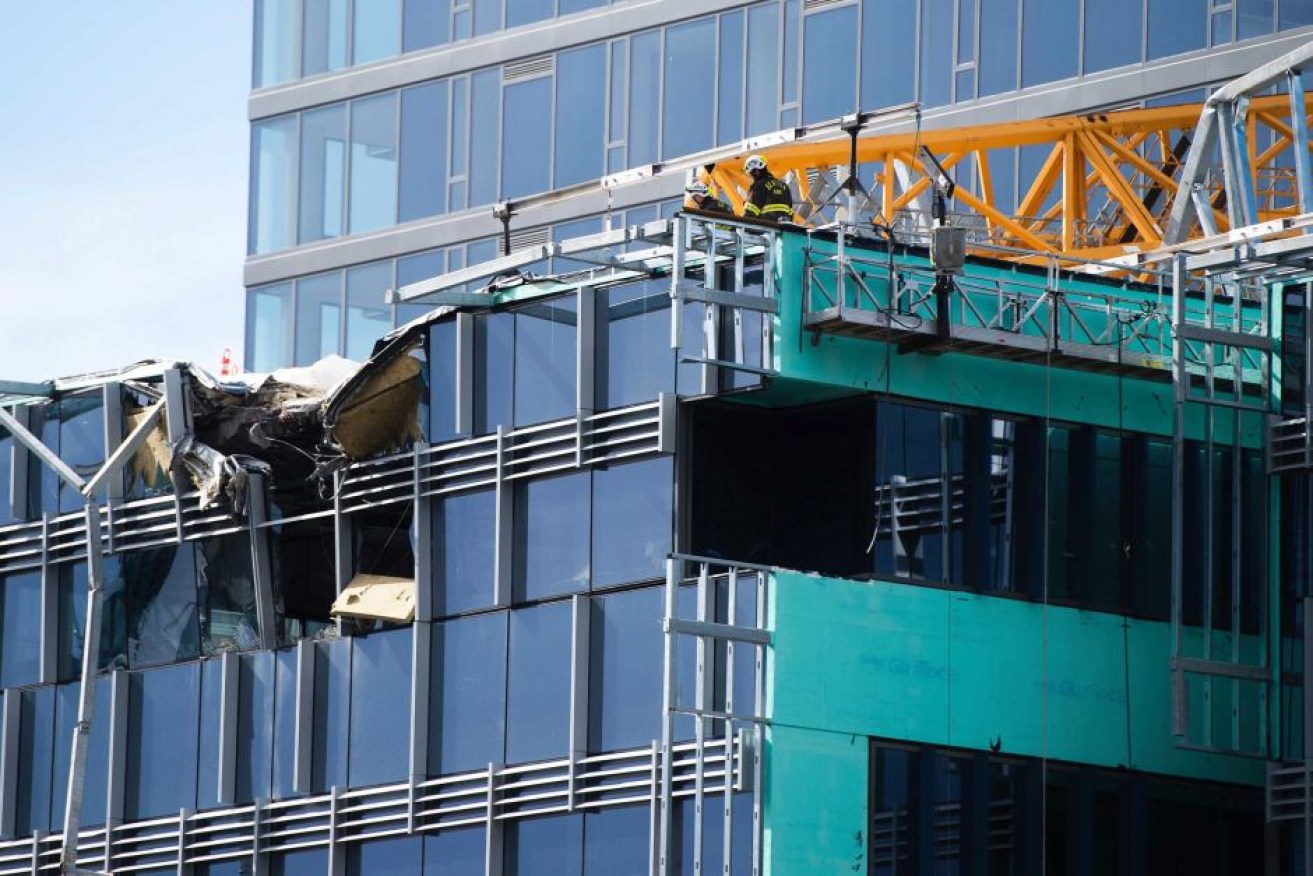A construction expert believes the crane was being dismantled when it was hit by heavy winds.