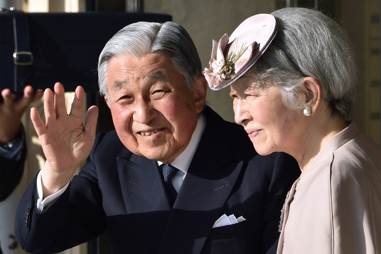 Emperor Akihito and Empress Michiko wave to well-wishers in Ise in central Japan in April. 