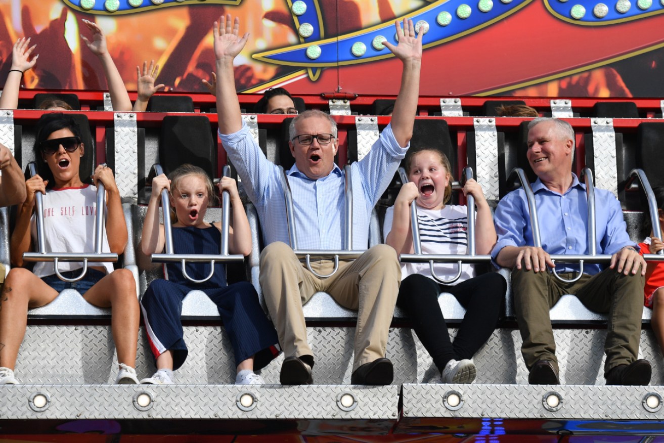 Prime Minister Scott Morrison with daughters Lily and Abbey (R) and Deputy Prime Minister Michael McCormack at the Sydney Royal Easter Show.