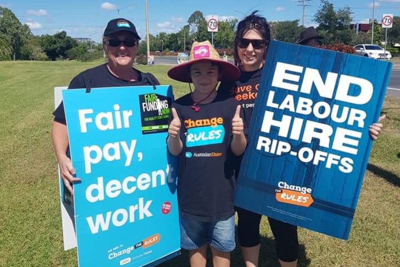 Debbie (L) with grandson Ash and daughter Danielle at a rally for wage growth. 