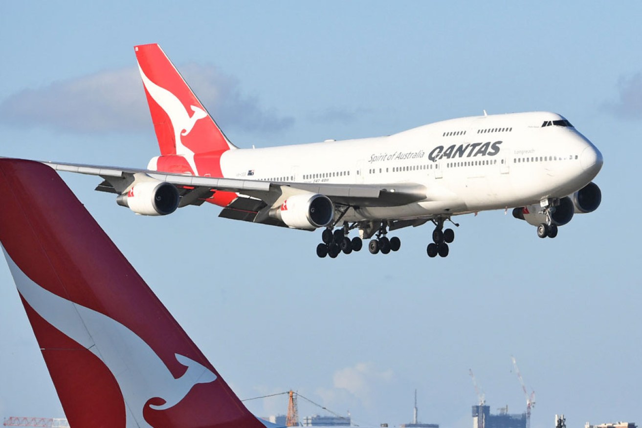 Qantas says it is laying off some people in its head office, but says figures being cited in various publications are inaccurate.