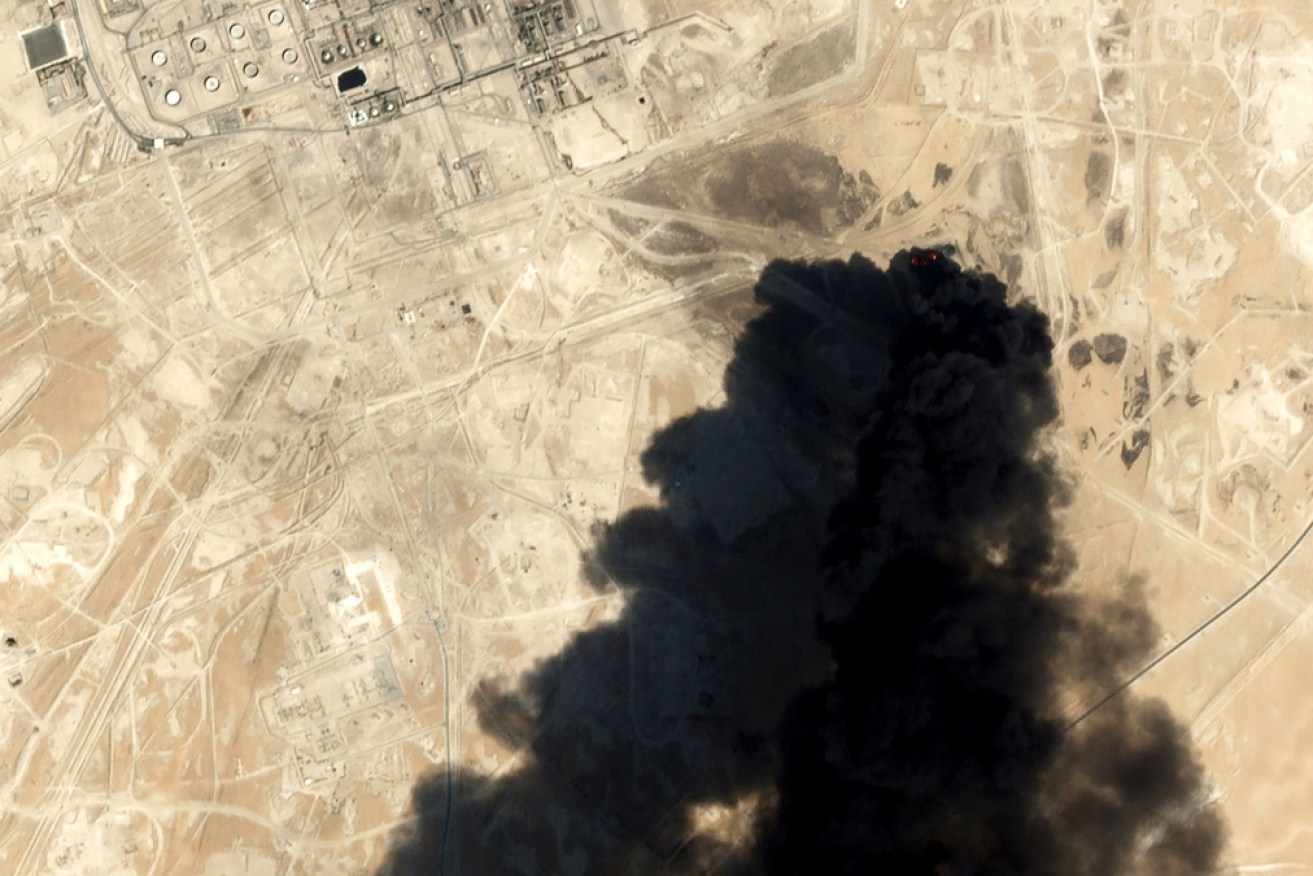 Black smoke rising from Saudi Aramco's Abqaiq oil processing facility in Buqyaq, Saudi Arabia.