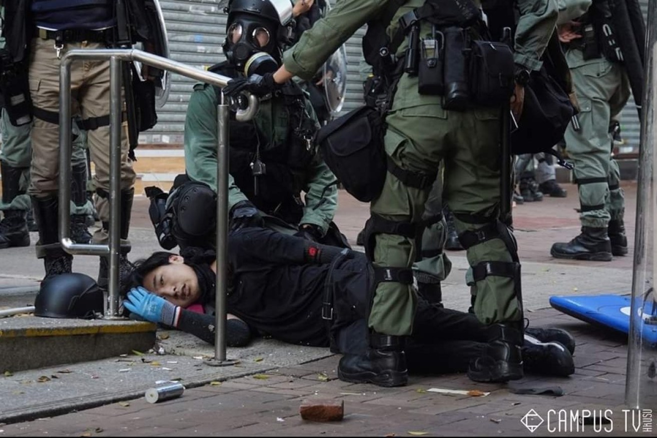 Student shot in Hong Kong as police open fire on China’s national day