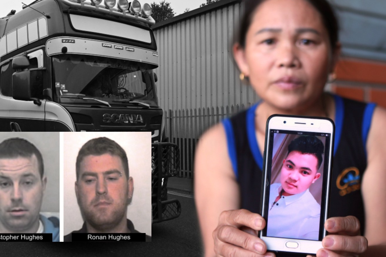 Hoang Thi Ai shows a photo of son Hoang Van Tiep, as police in the UK hunt suspects. 