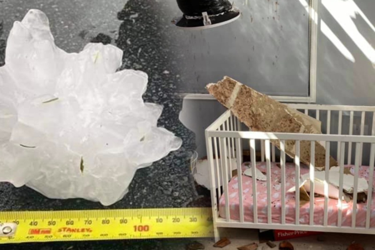 Huge hail stones have destroyed hundreds of houses in Queensland.