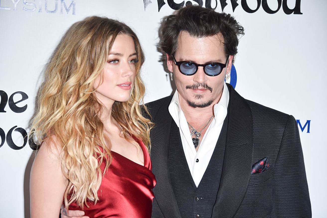 The court took Amber Heard's word that Johnny Deep beat, kicked and abused her, charges he denies.