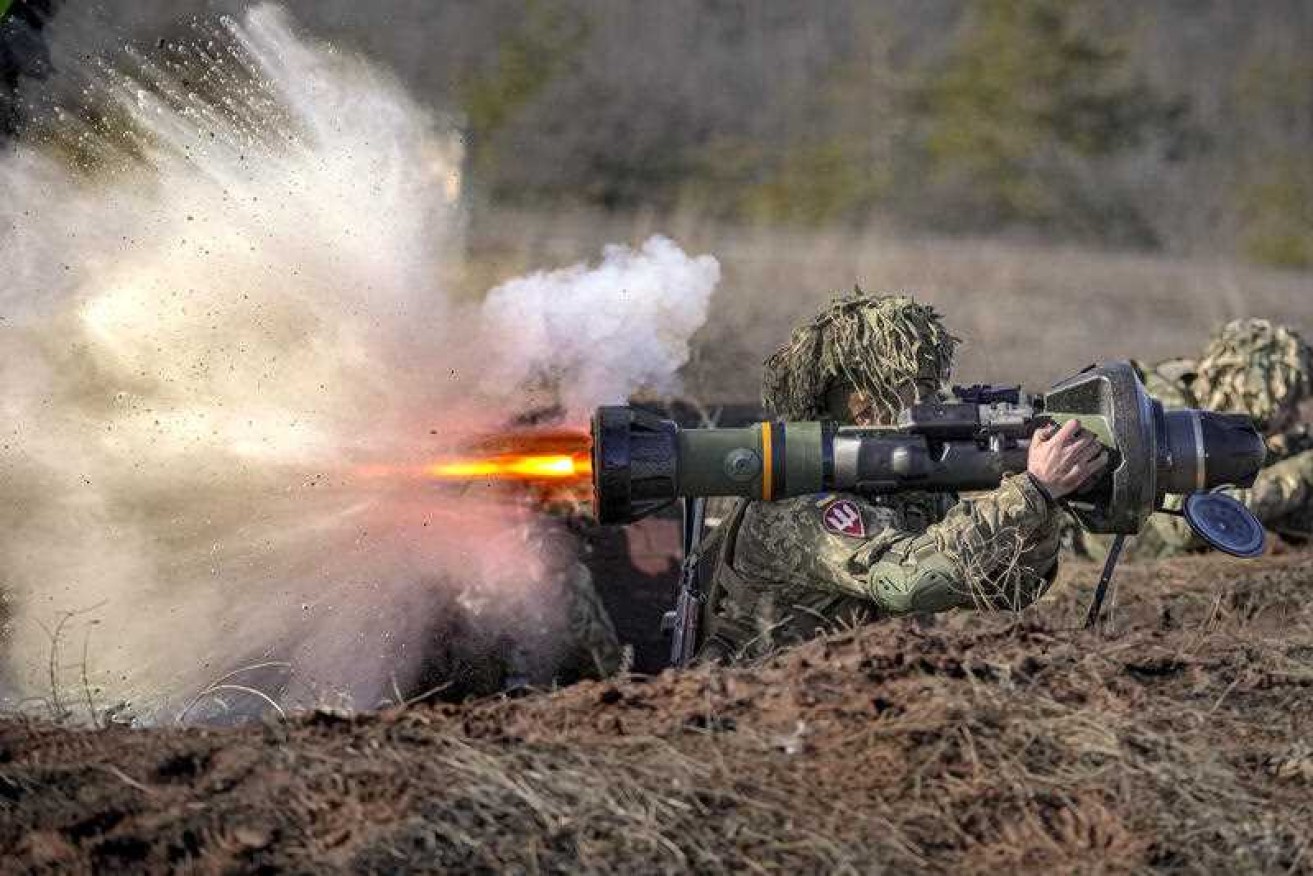 A Ukrainian soldier unleashes an anti-tank missile from the beleaguered nation's dwindling stock.