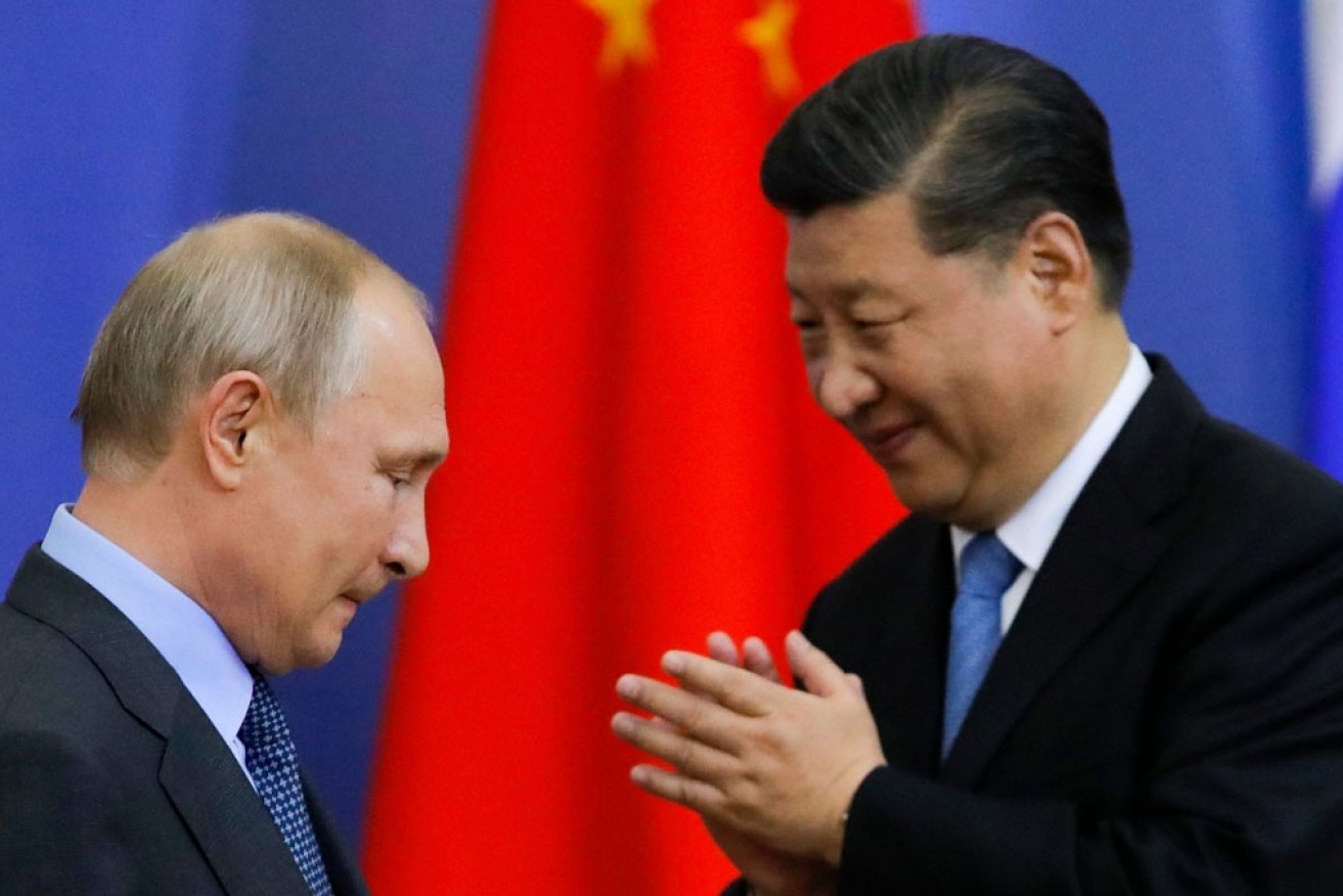 As Russia's economy tanks, Vladimir Putin will become even more reliant on Xi Jinping's support. <i>Photo: Getty</i>