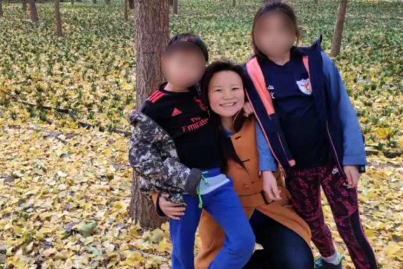 Imprisoned Australian journalist Cheng Lei with the children she hasn't seen for two years. <i>Photo: AAP</i>