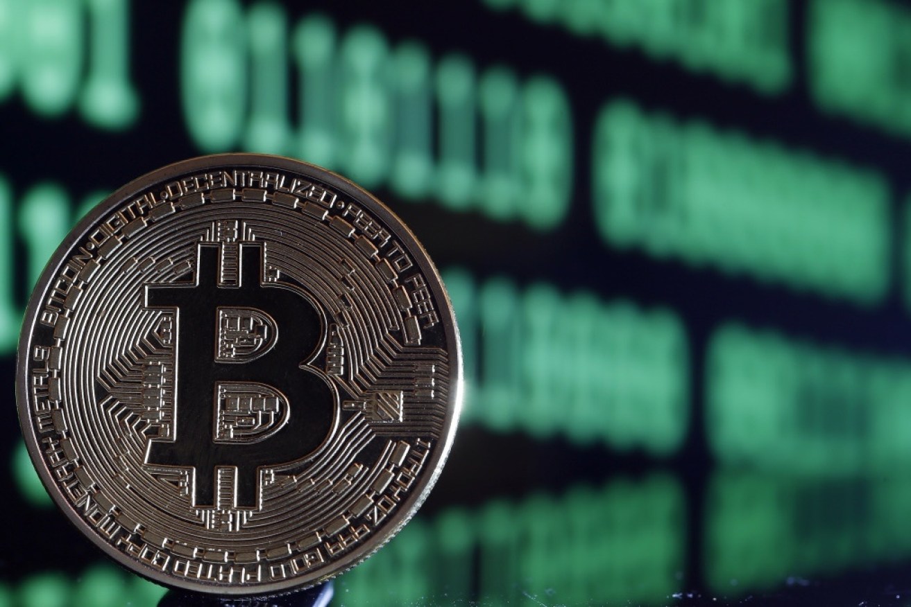 The bitcoin all-time high marks a turning point for cryptocurrency, experts say.