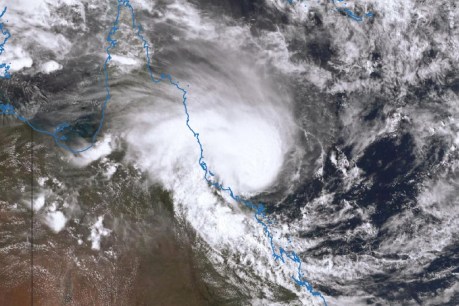 Cyclone Kirrily crosses Qld coast in Townsville