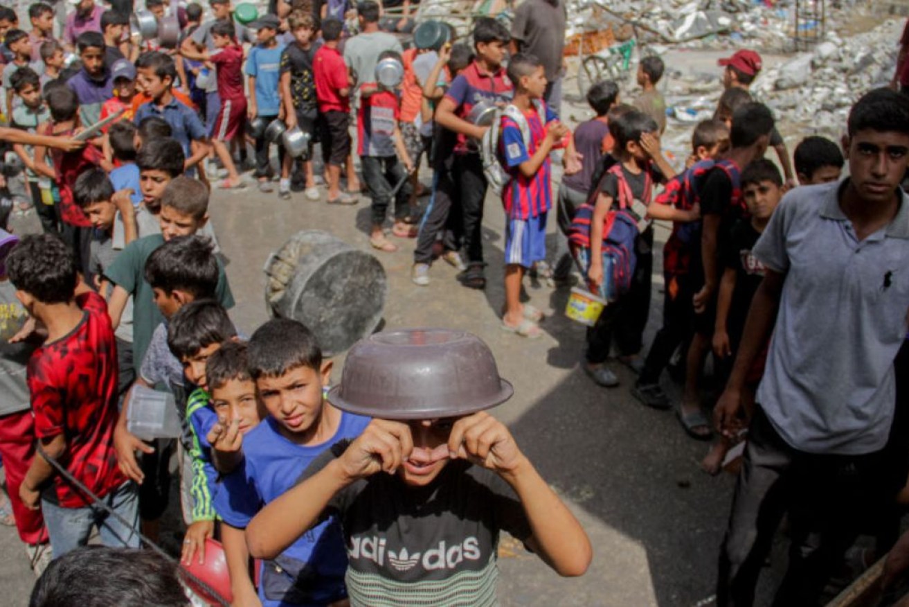 UN agencies say banning its relief agency could see famine develop across Gaza.