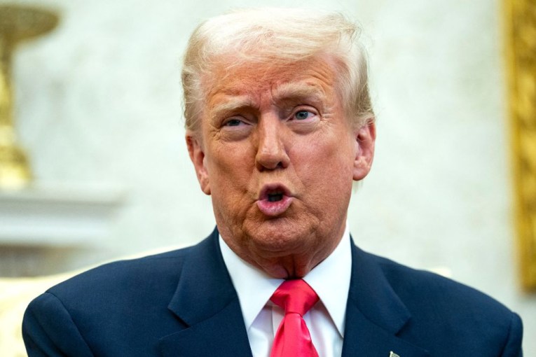 Trump distances himself from group chat scandal