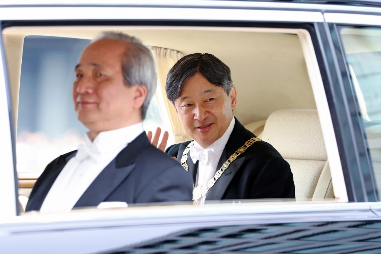 Japan's new Emperor Naruhito leaves the Imperial Palace after the ascension ceremony. Photo: AAP