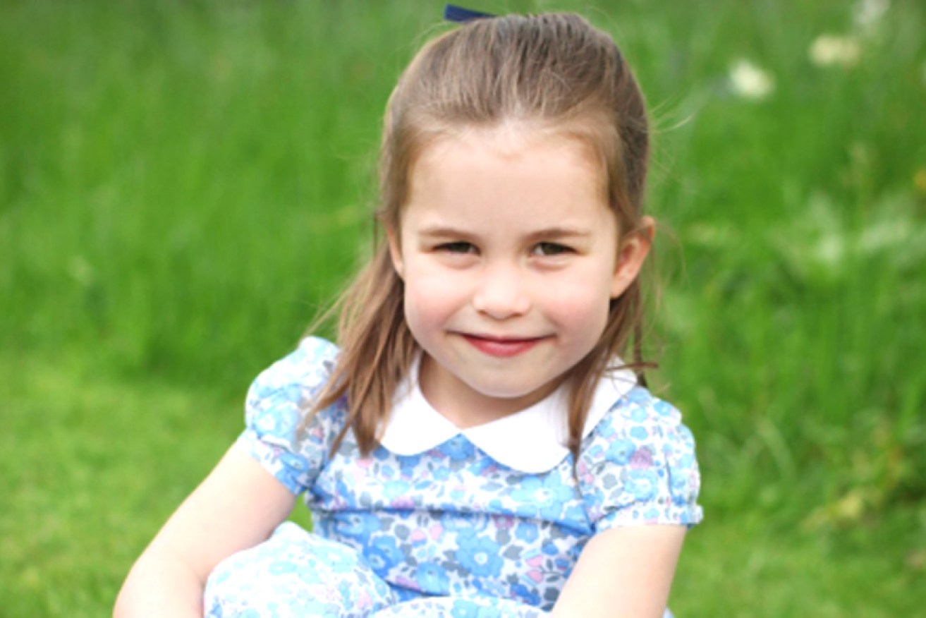 Princess Charlotte in the garden of at Kensington Palace.