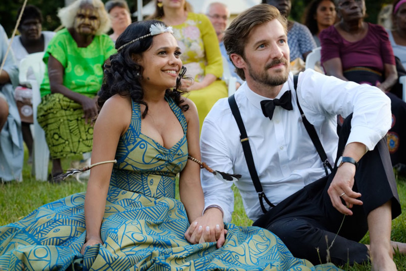 Miranda Tapsell and Gwilym Lee tie the knot Tiwi Islands style in <i>Top End Wedding.</i>