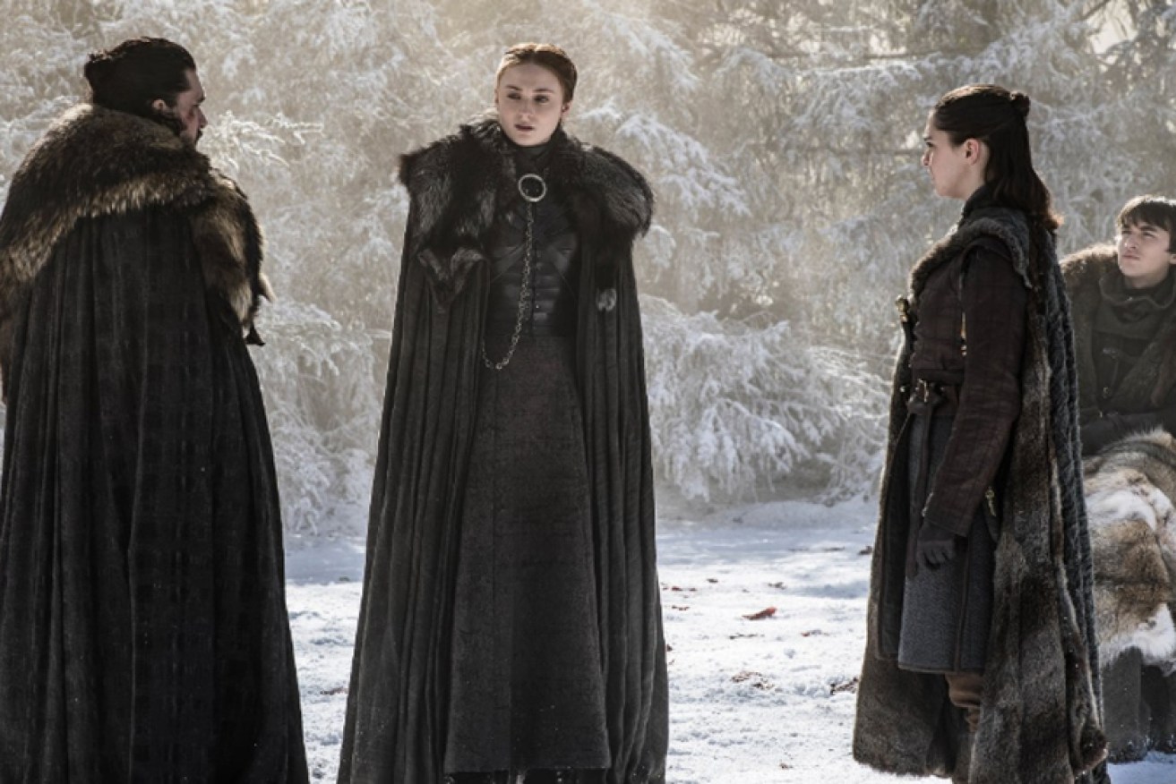 The Stark crew talks tactics at Winterfell in <i>Game of Thrones.</i>