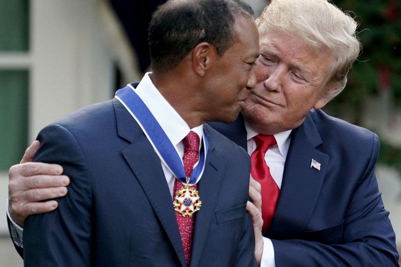 Tiger Woods and Donald Trump at Tuesday's White House award ceremony.