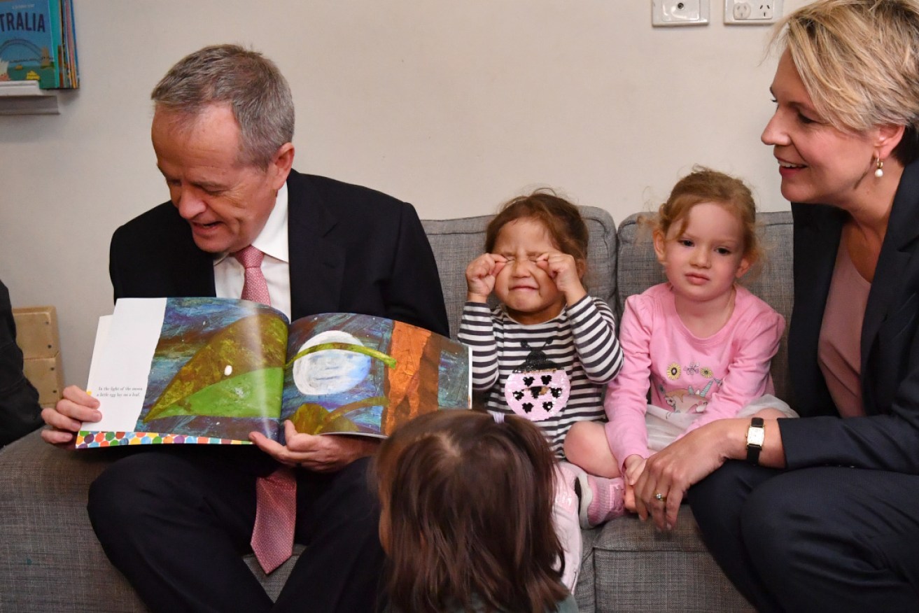 Australian Opposition Leader Bill Shorten and Deputy Opposition Leader Tanya Plibersek try to hold the attention of children at the Goodstart Early Learning Centre in Perth, on April 29.