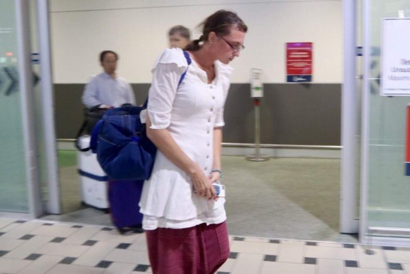 Yoshe Taylor arrives at Brisbane airport after being freed from jail in Cambodia.