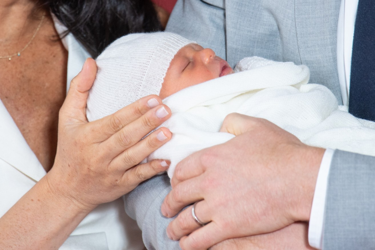 Two-day-old Master Archie Harrison Mountbatten-Windsor in his father Prince Harry's arms on May 8.