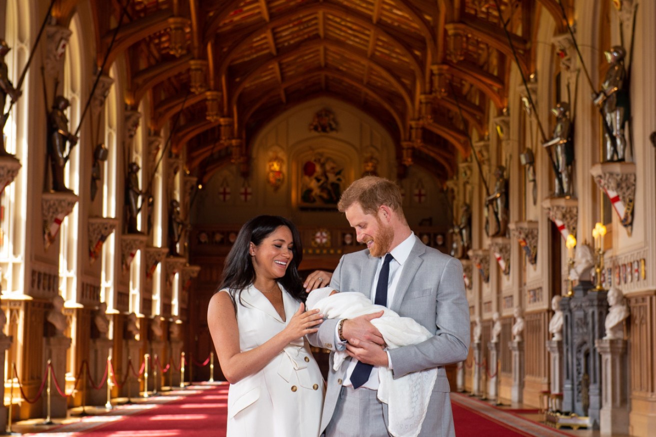 Ta da! The Duke and Duchess of Sussex present son Archie Harrison Mountbatten-Windsor on May 8. 