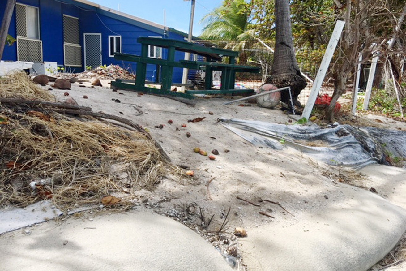 A home on Poruma Island in the Torres Strait, with only sandbags between its back door and the high tide mark.