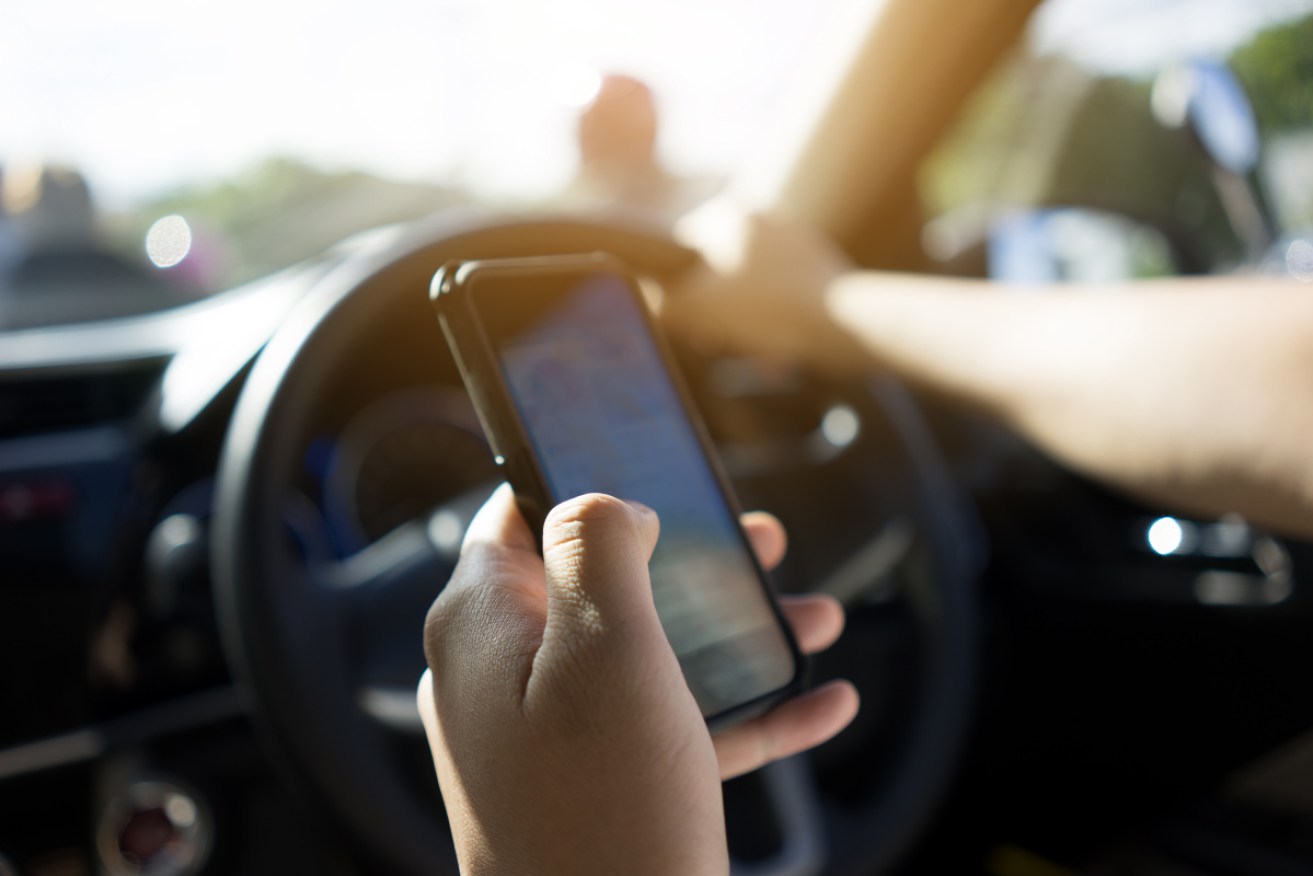 Queensland is to introduce the nation's stiffest penalties for drivers who use their phones.