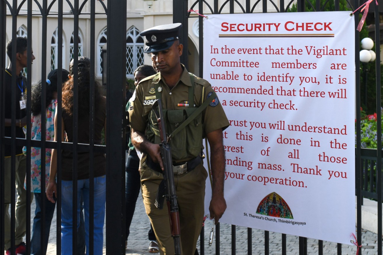 Sri Lanka's Catholic churches have resumed giving services – but under heavy guard.
