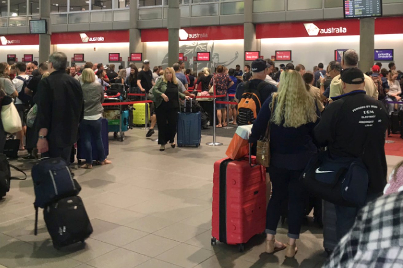 There were lengthy queues at the Virgin counters at Brisbane Airport.