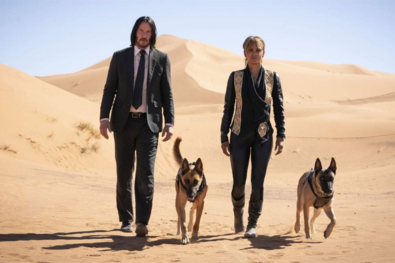 Keanu Reeves and Halle Berry hit the trail in <i>John Wick: Chapter 3 – Parabellum.</i>