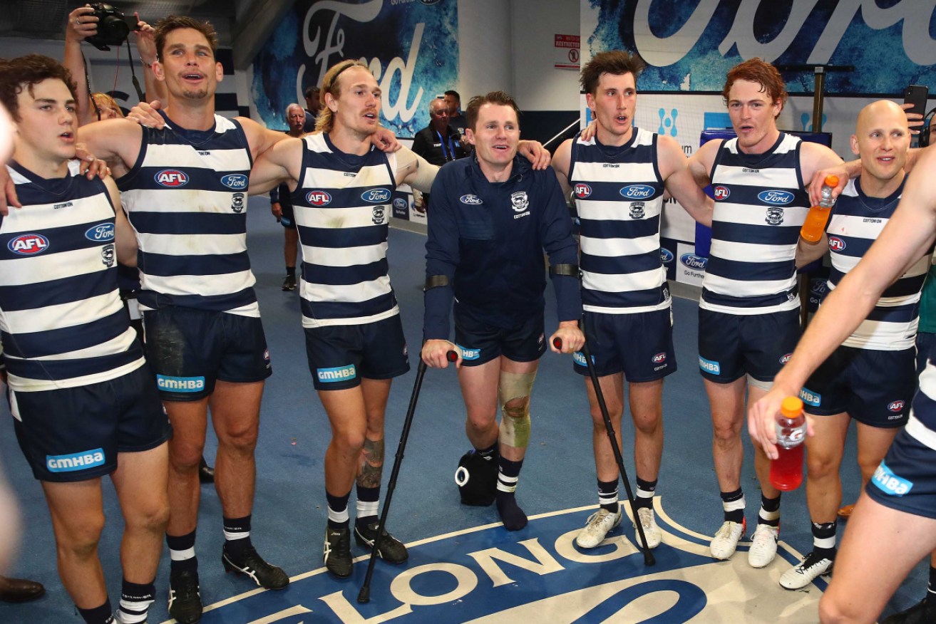 Geelong players celebrate, but Patrick Dangerfield will be out for a couple of weeks. 