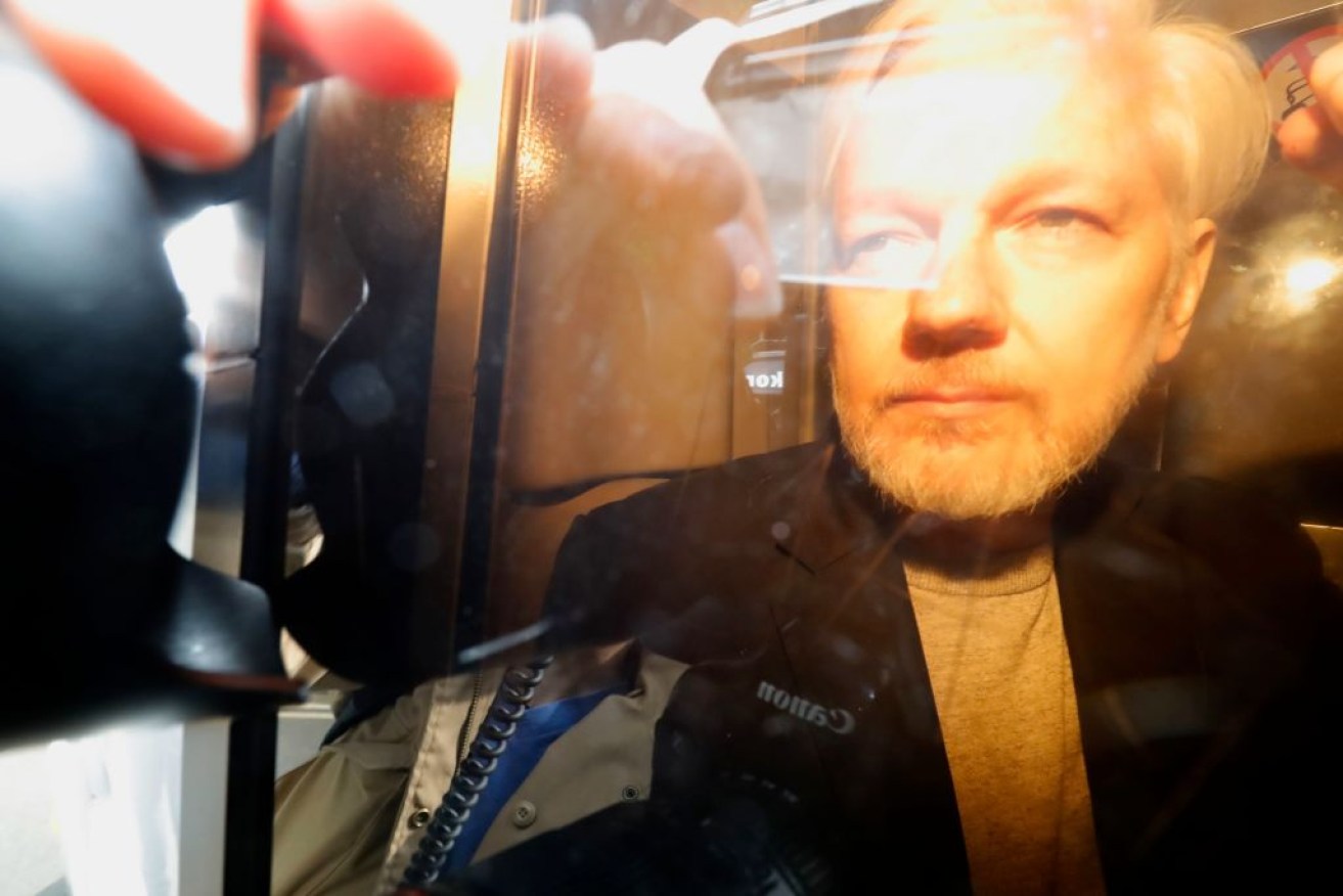 WikiLeaks founder Julian Assange arrives at court in London on May 1, 2019 to be sentenced for bail violation.