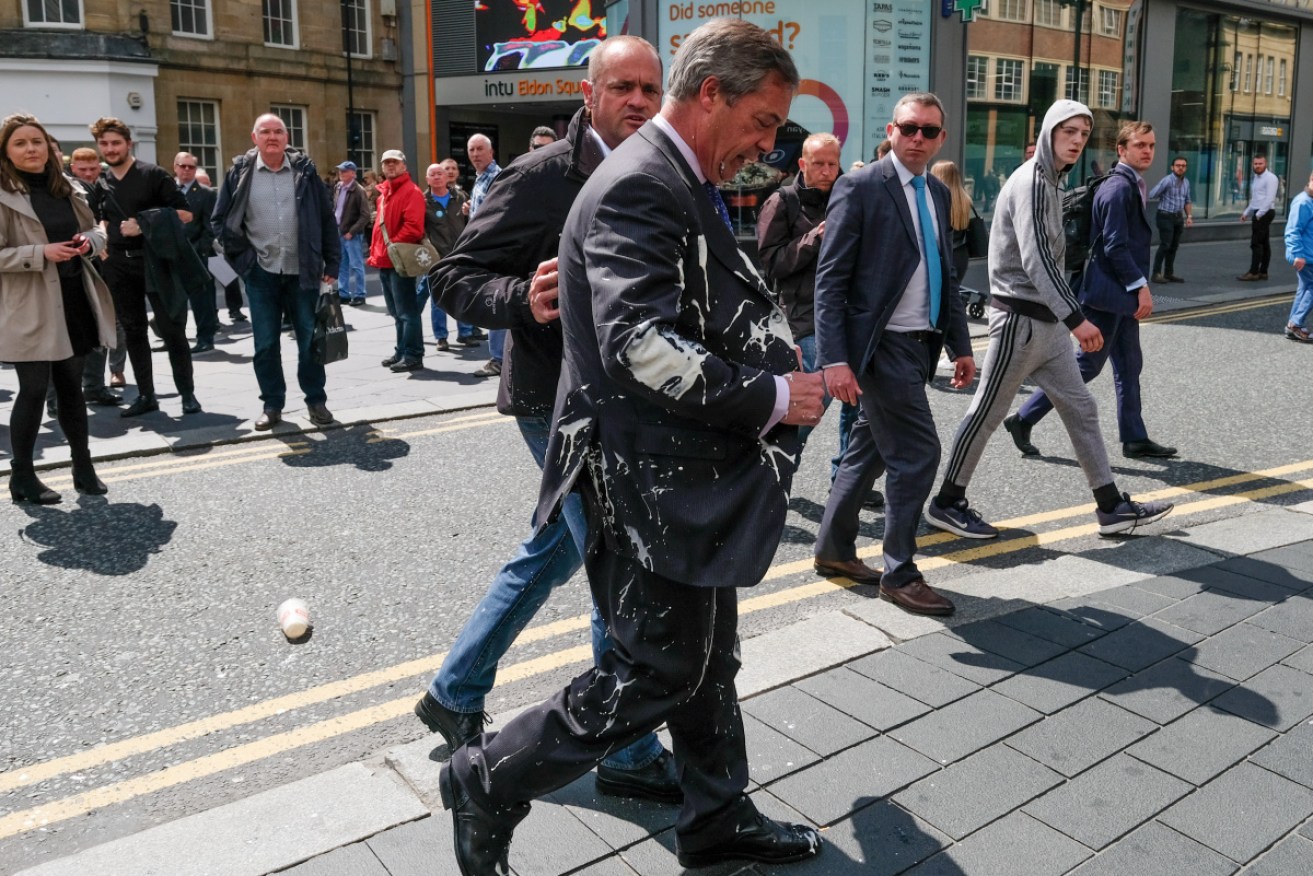 Pro-Brexit leader Nigel Farage after being hit with a milkshake at a campaign rally in Britain.