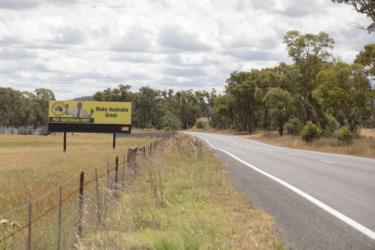 One of Clive Palmer's signs on the roadside of Portland, New South Wales. 