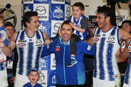 AFL: North Melbourne&#8217;s Brad Scott gives a verbal hip-and-shoulder to key critic on his way out