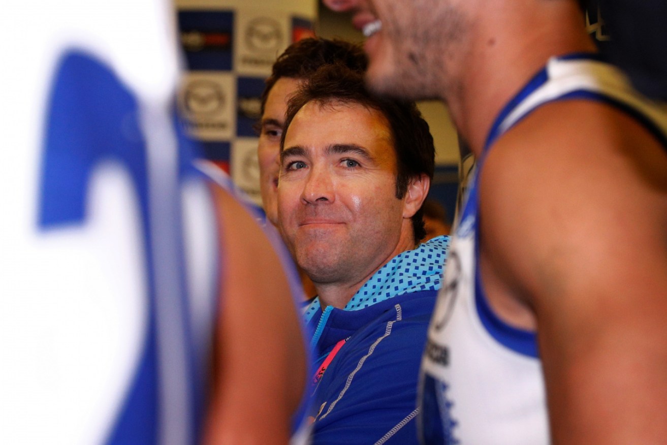 Brad Scott in the rooms after coaching his last game for North Melbourne. 
