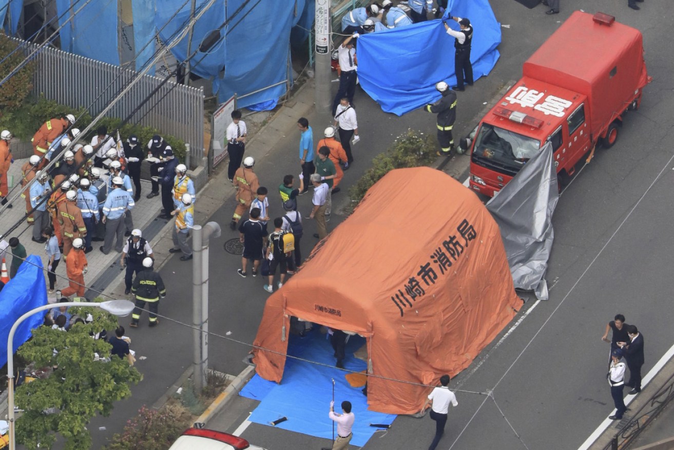 An aerial image showing the emergency response to a stabbing attack outside the Japanese capital Tokyo. 