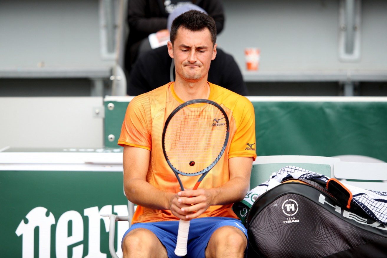 An unhappy Bernard Tomic during his straight-set first-round French Open loss.