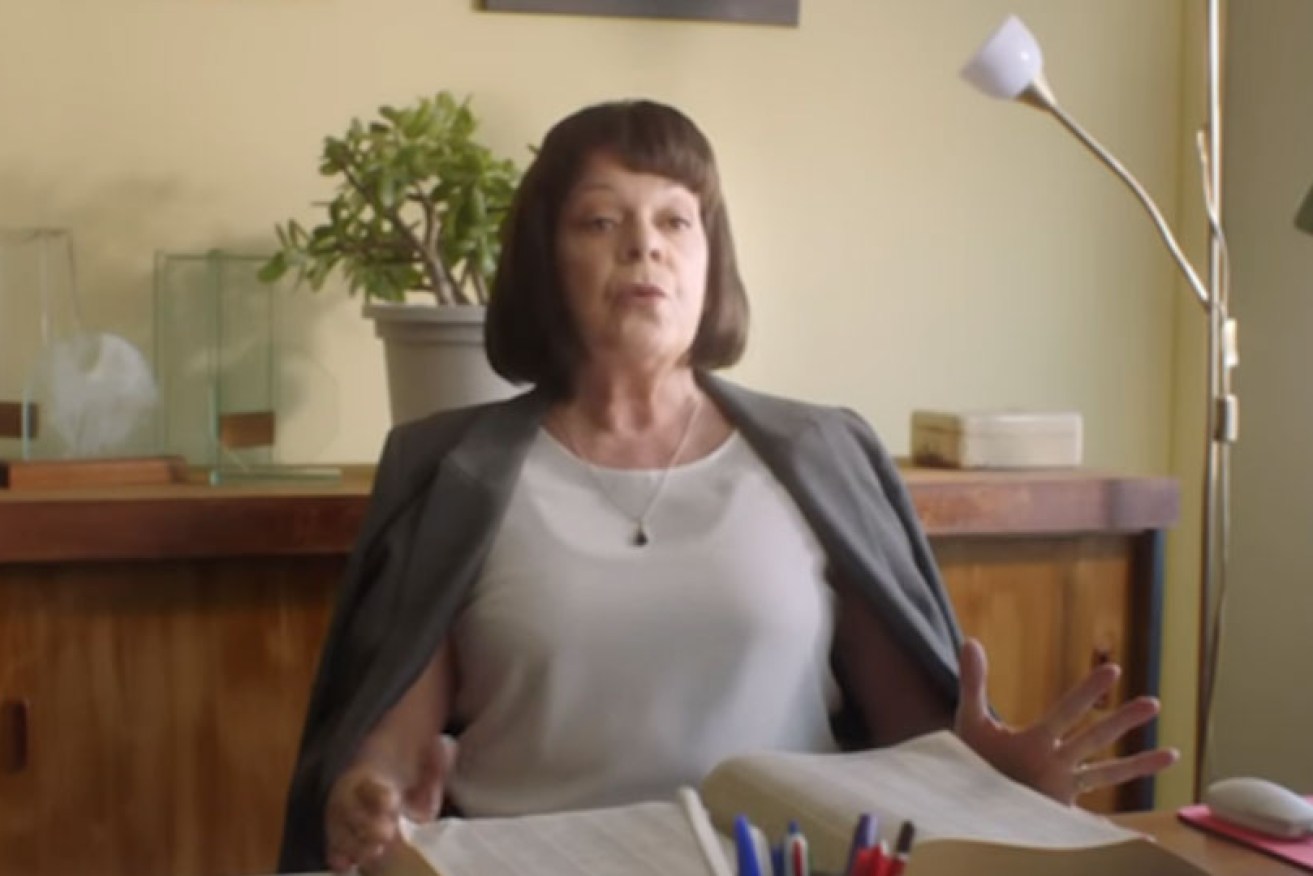 Jan's acerbic boss, played by Deborah Kennedy, lets fly in the new 'No worries Jan' ad.